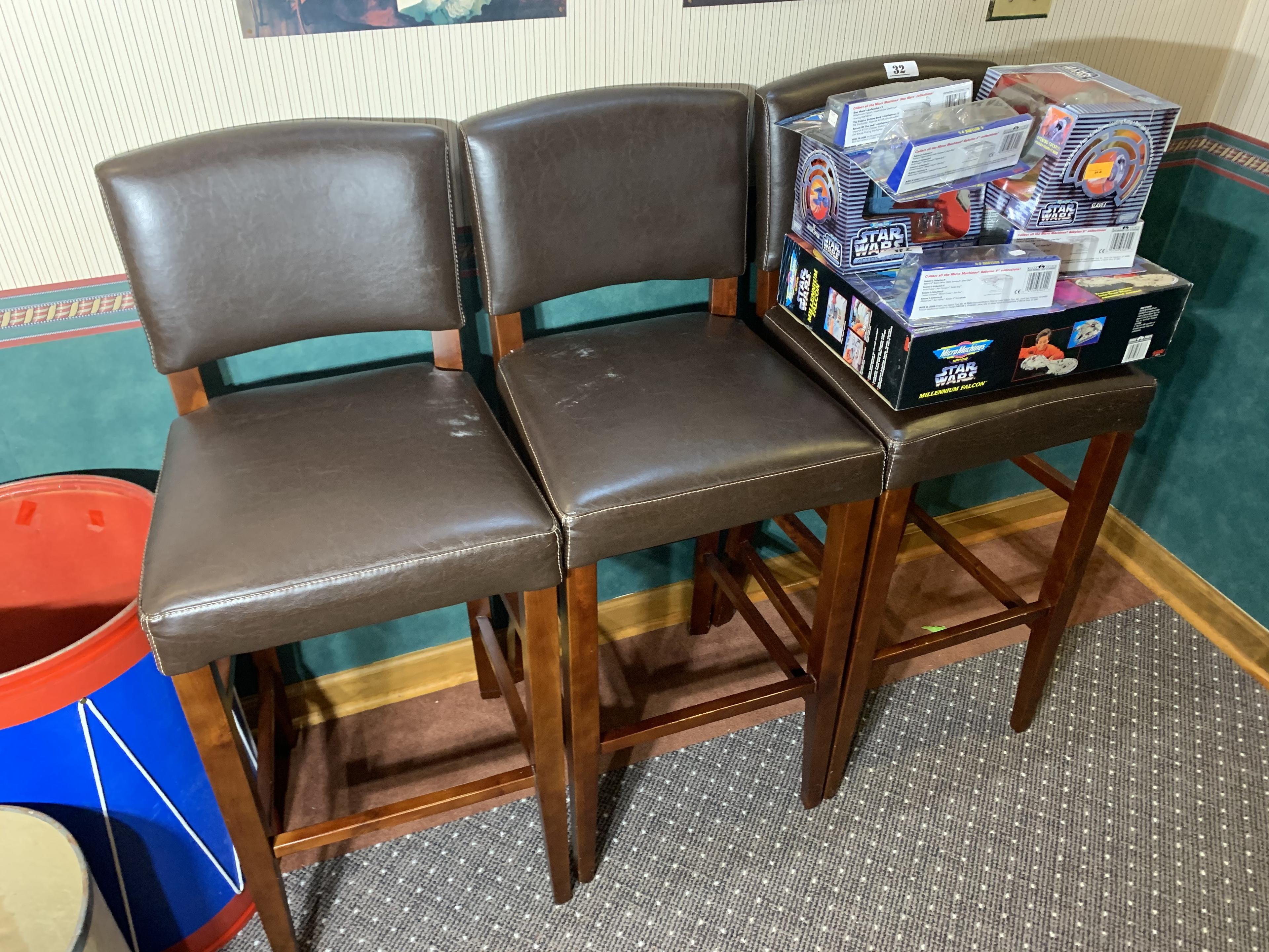 Group lot of three bar stools or raised chairs