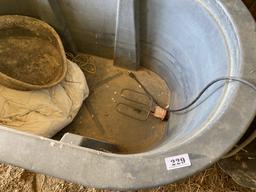 Two large water tubs including heated.