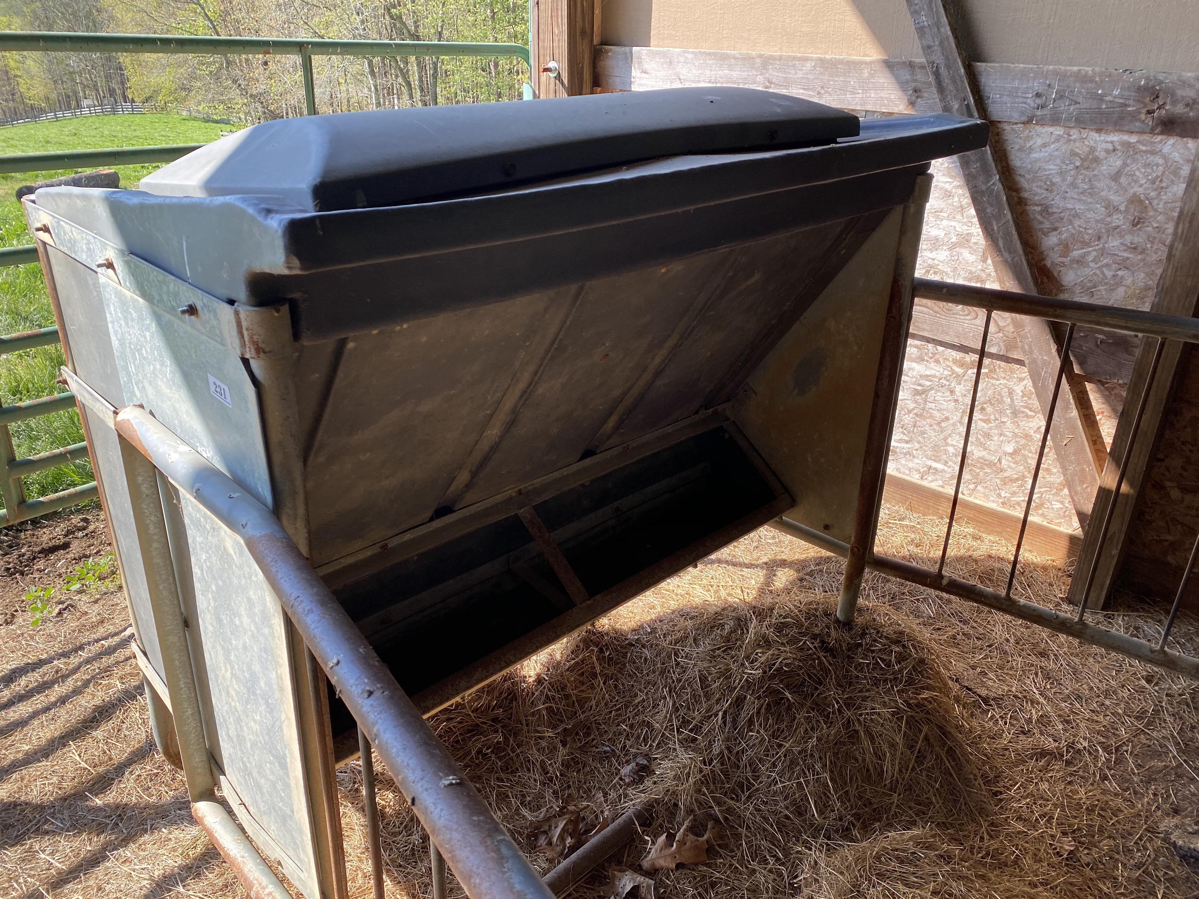 Metal and plastic cattle bale feeder