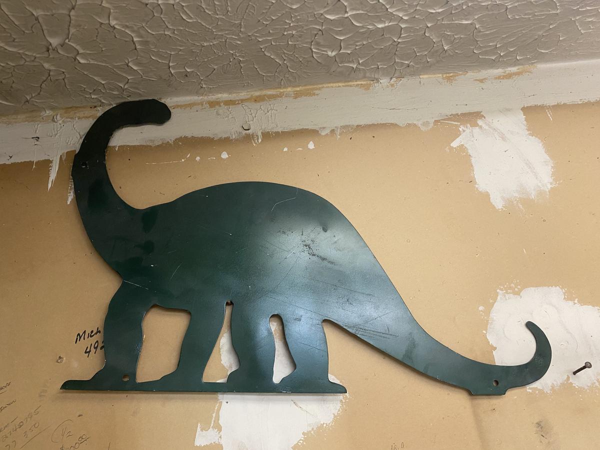Old Metal Sinclair dinosaur cutout sign