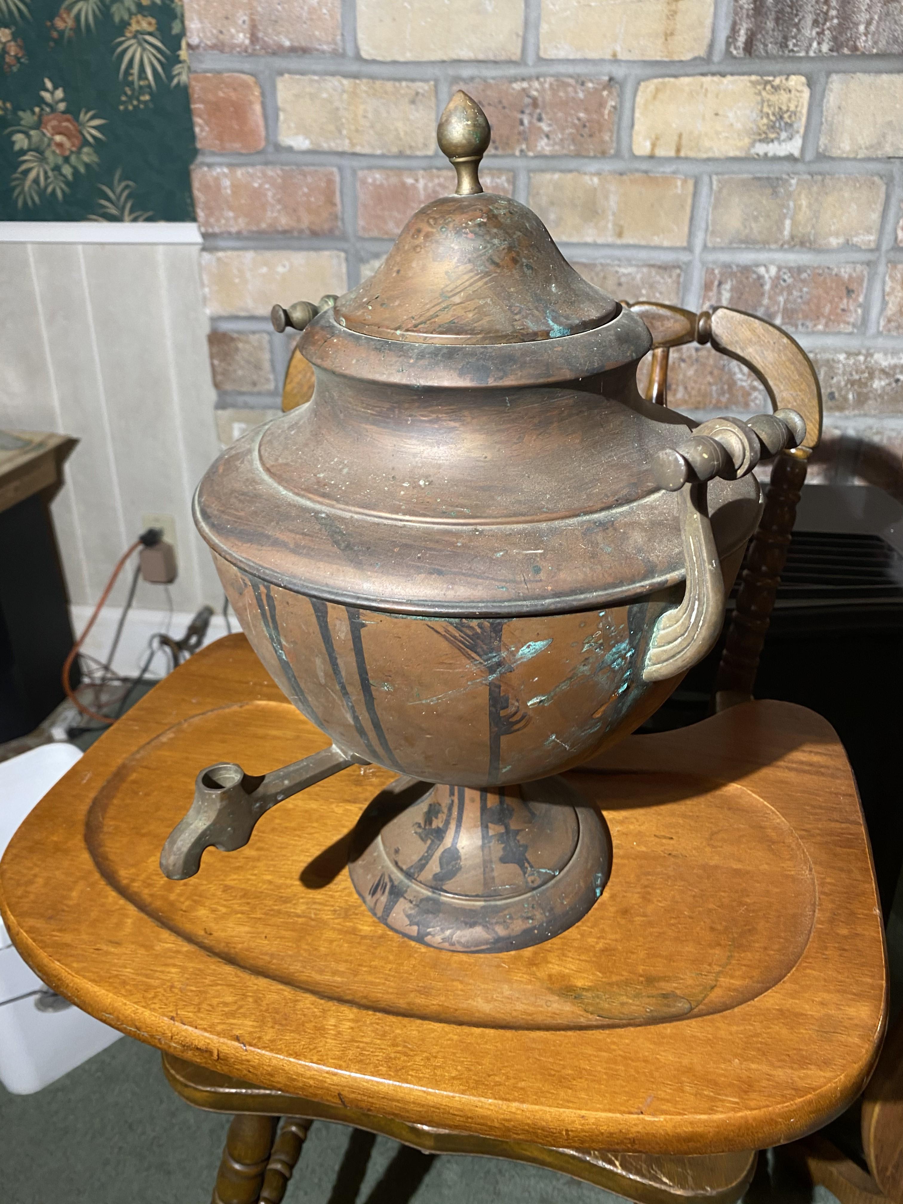 High Chair, Pedestal, Copper coffee pot, stamp dispenser