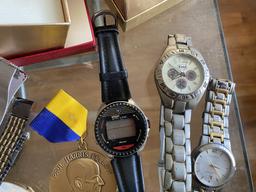 Table lot of watches, jewelry and more