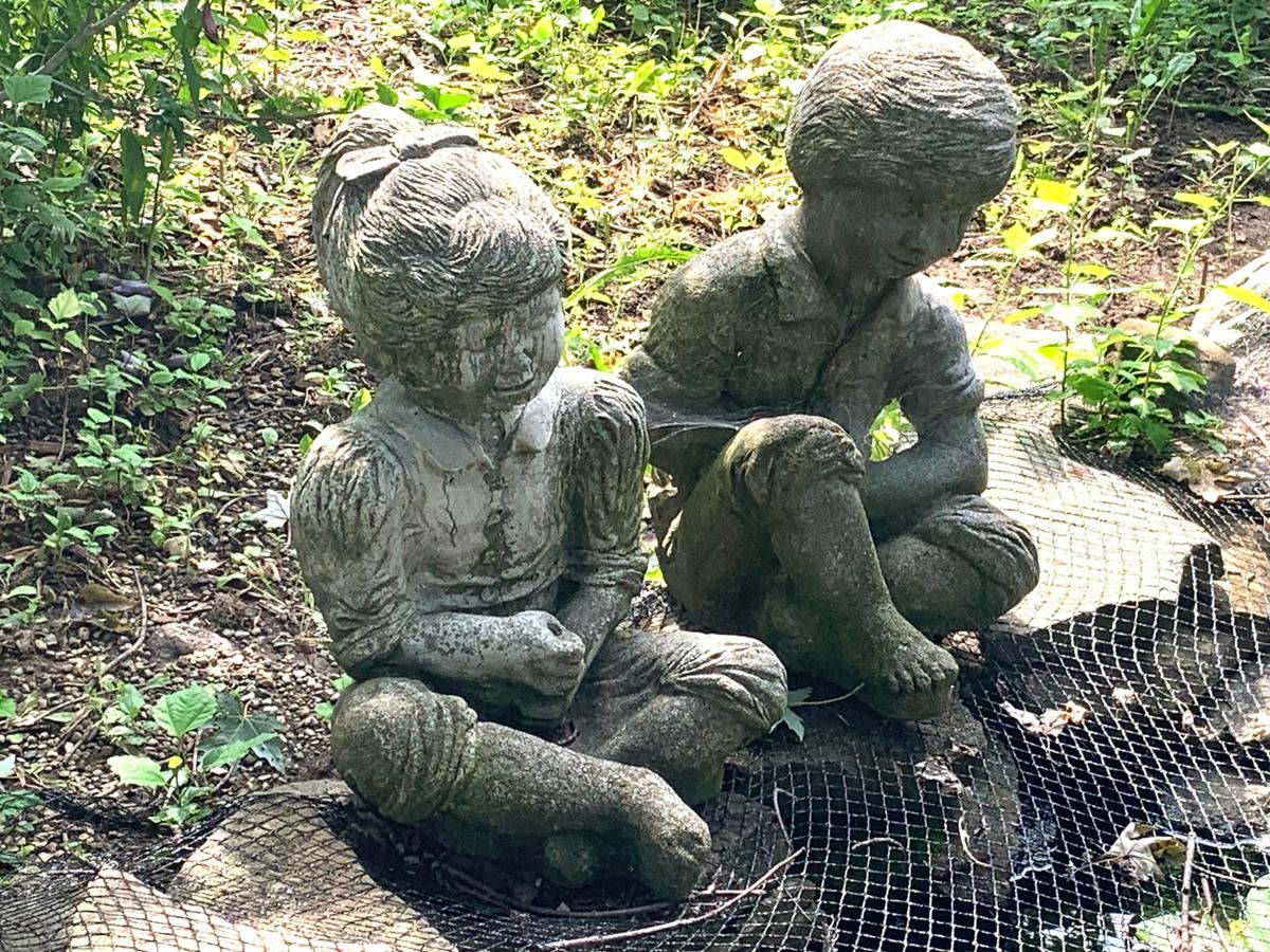 Boy & Girl Cement Statues