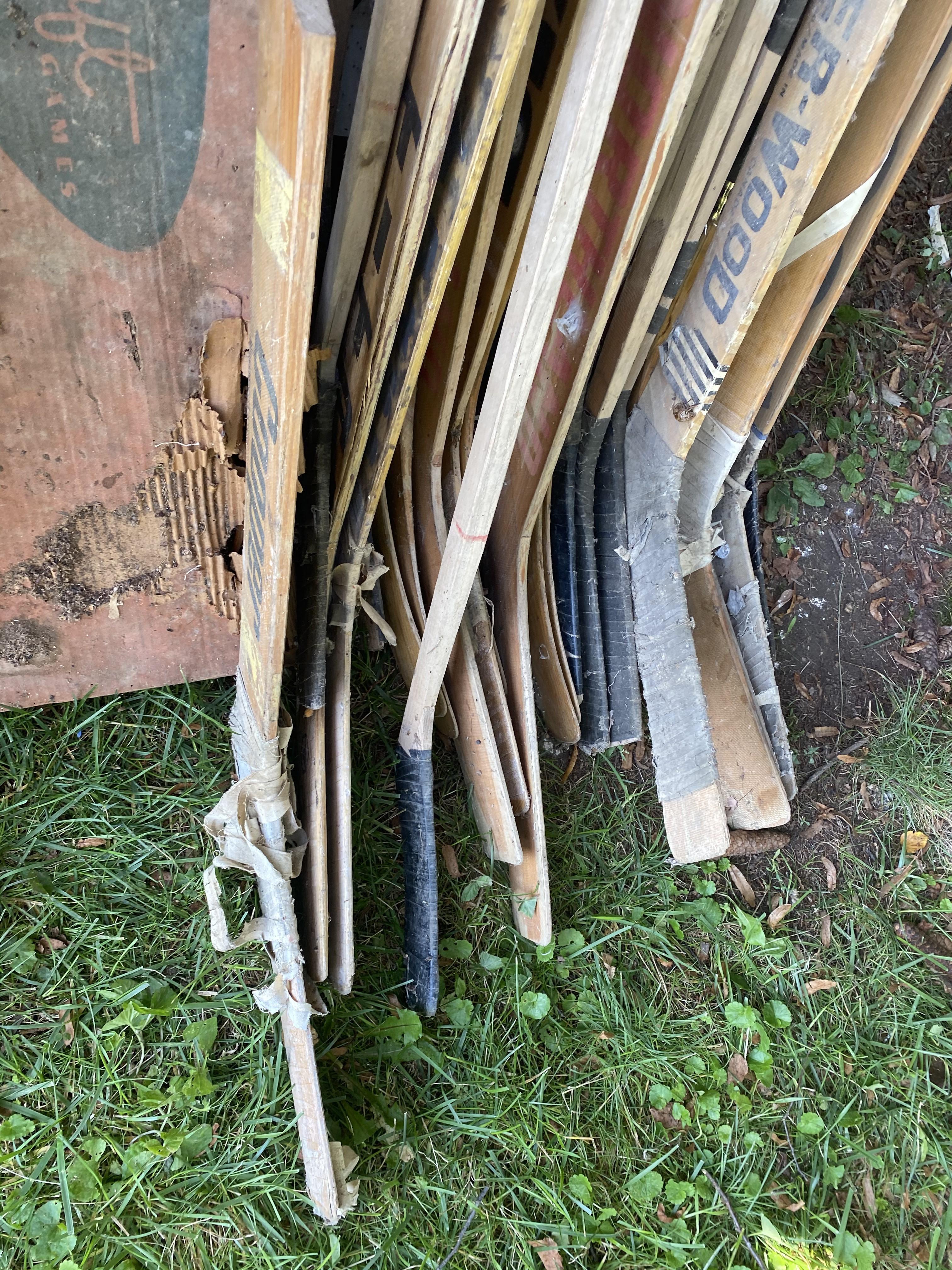 Large lot of vintage Hockey Sticks