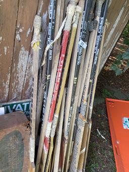 Large lot of vintage Hockey Sticks