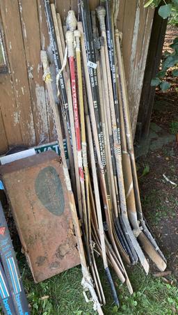 Large lot of vintage Hockey Sticks