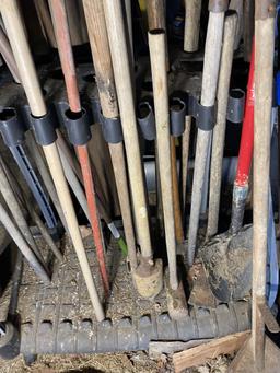 Large number of hand tools on stand