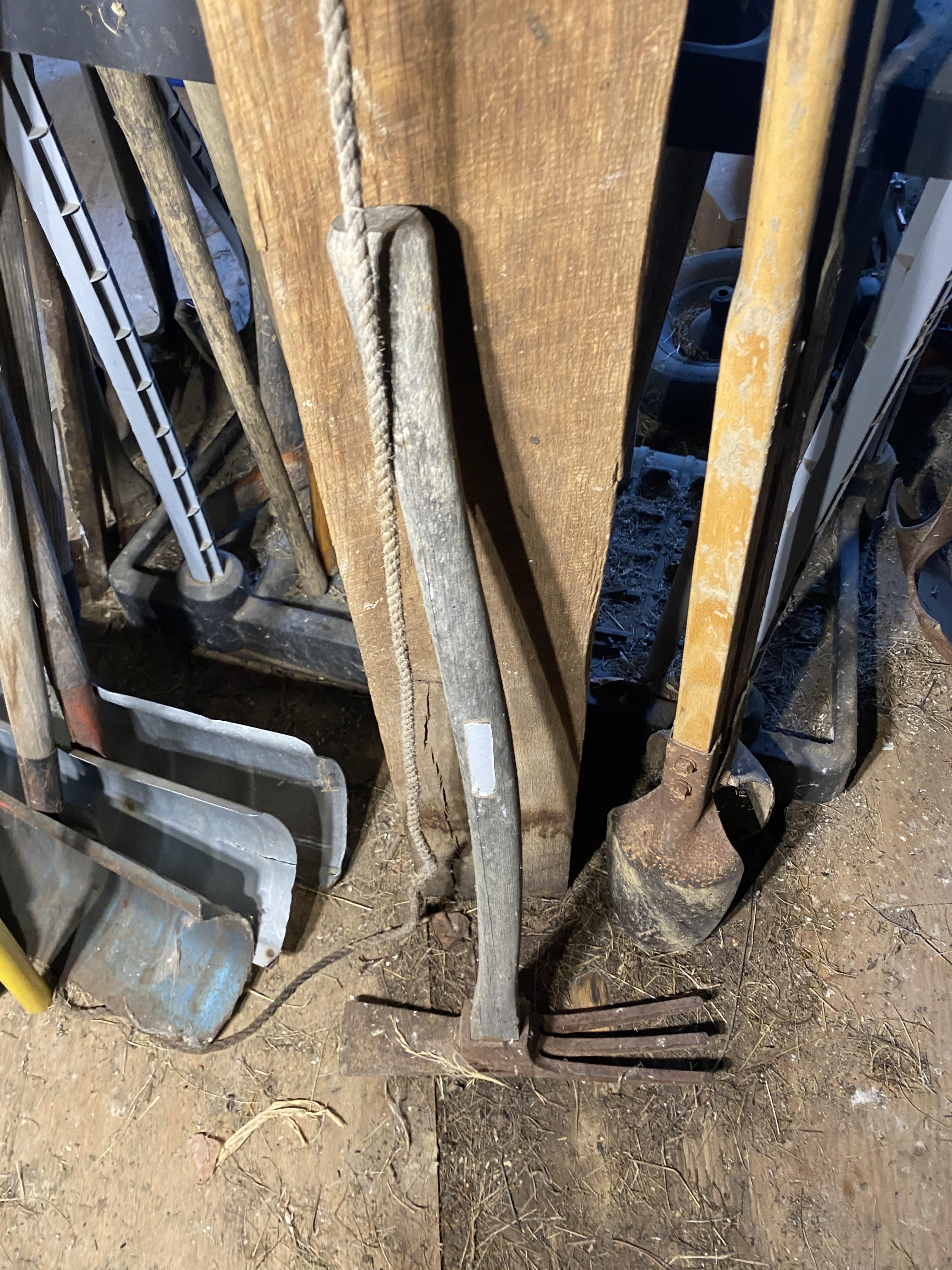 Large number of hand tools on stand