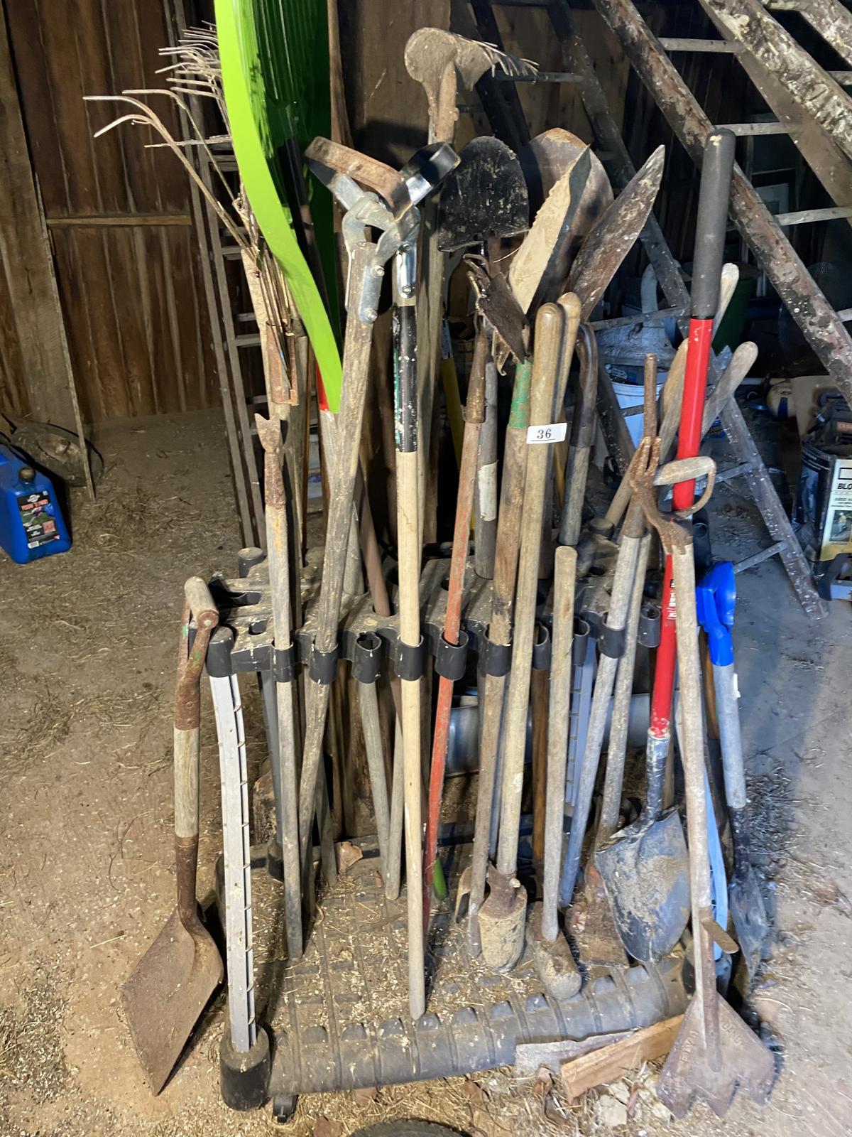 Large number of hand tools on stand