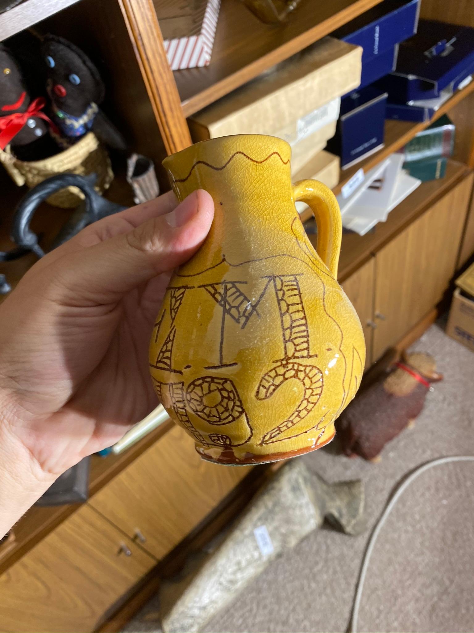 Shelf lot of decorative pottery, steins