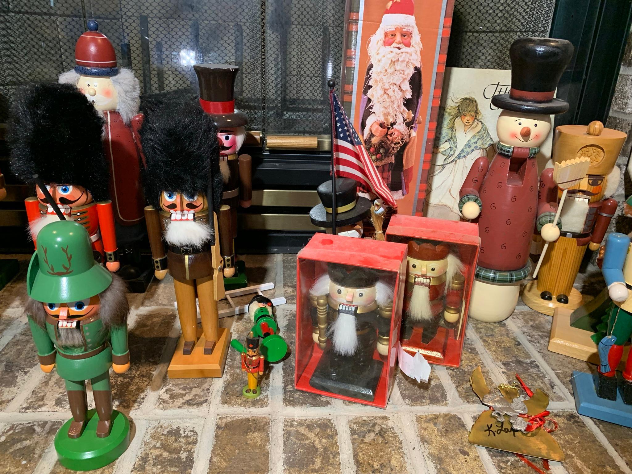 Large Group of Nut Crackers, Brass Candle Holders, Holiday Items, Frames & More