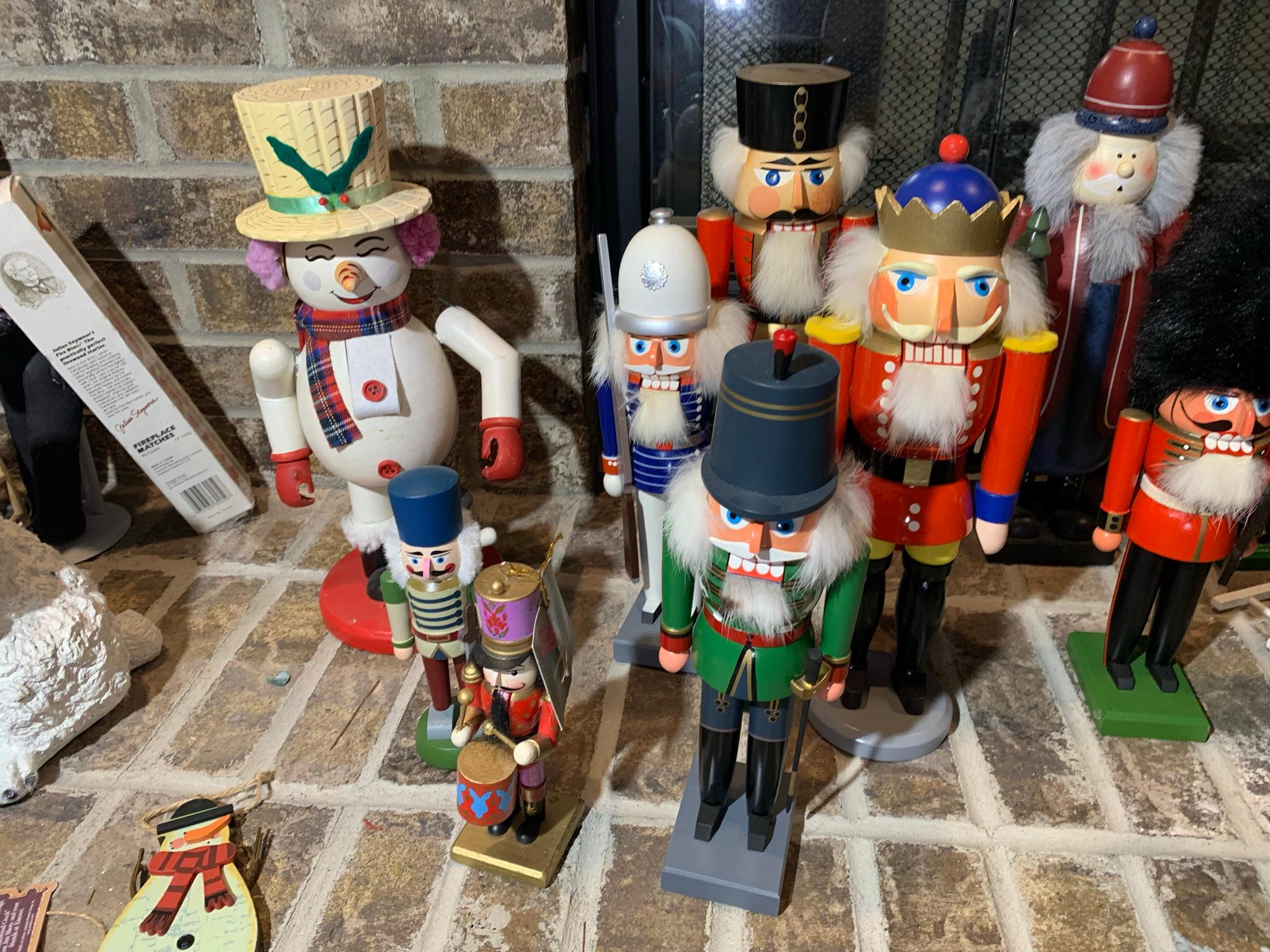 Large Group of Nut Crackers, Brass Candle Holders, Holiday Items, Frames & More