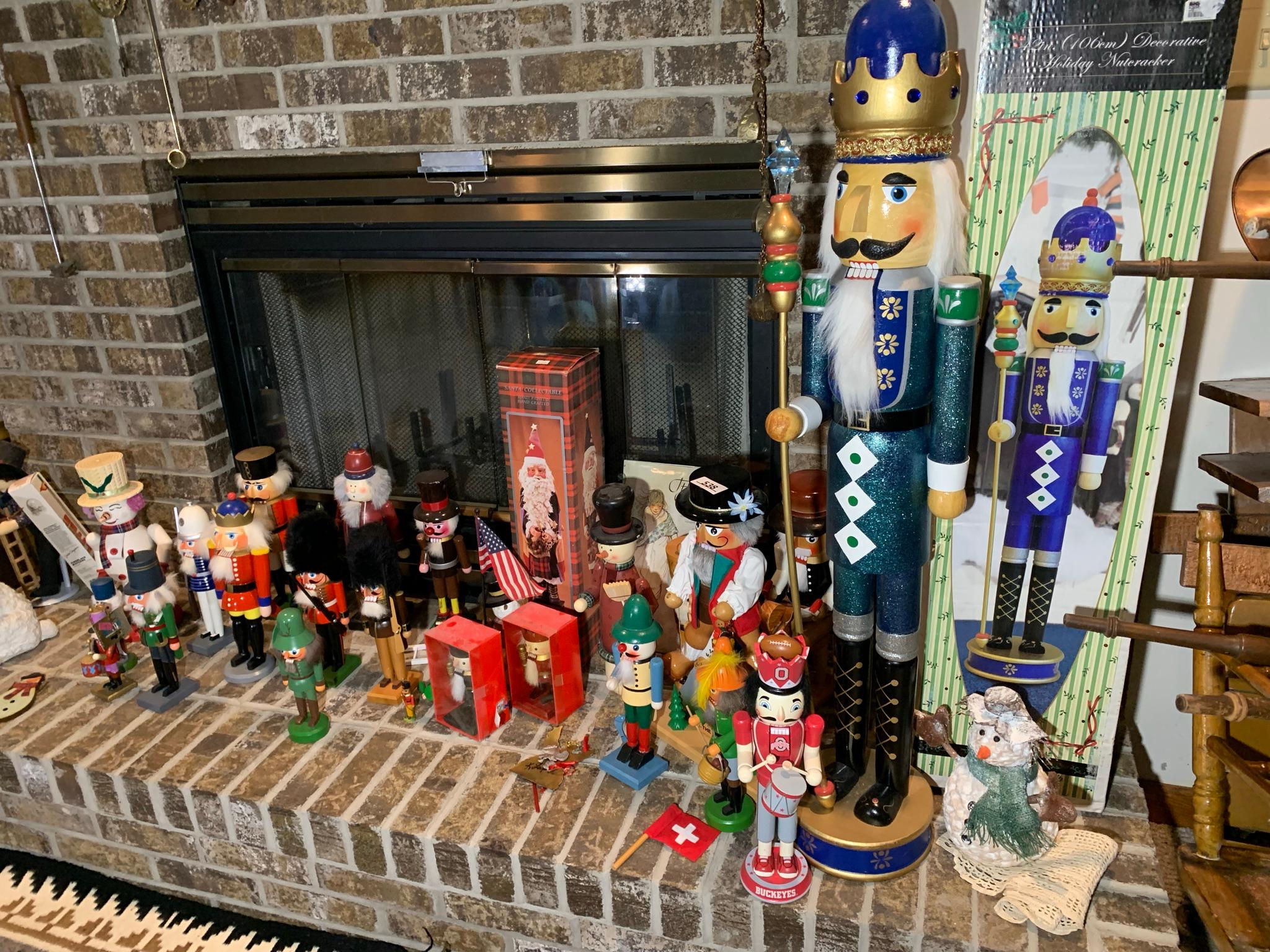 Large Group of Nut Crackers, Brass Candle Holders, Holiday Items, Frames & More