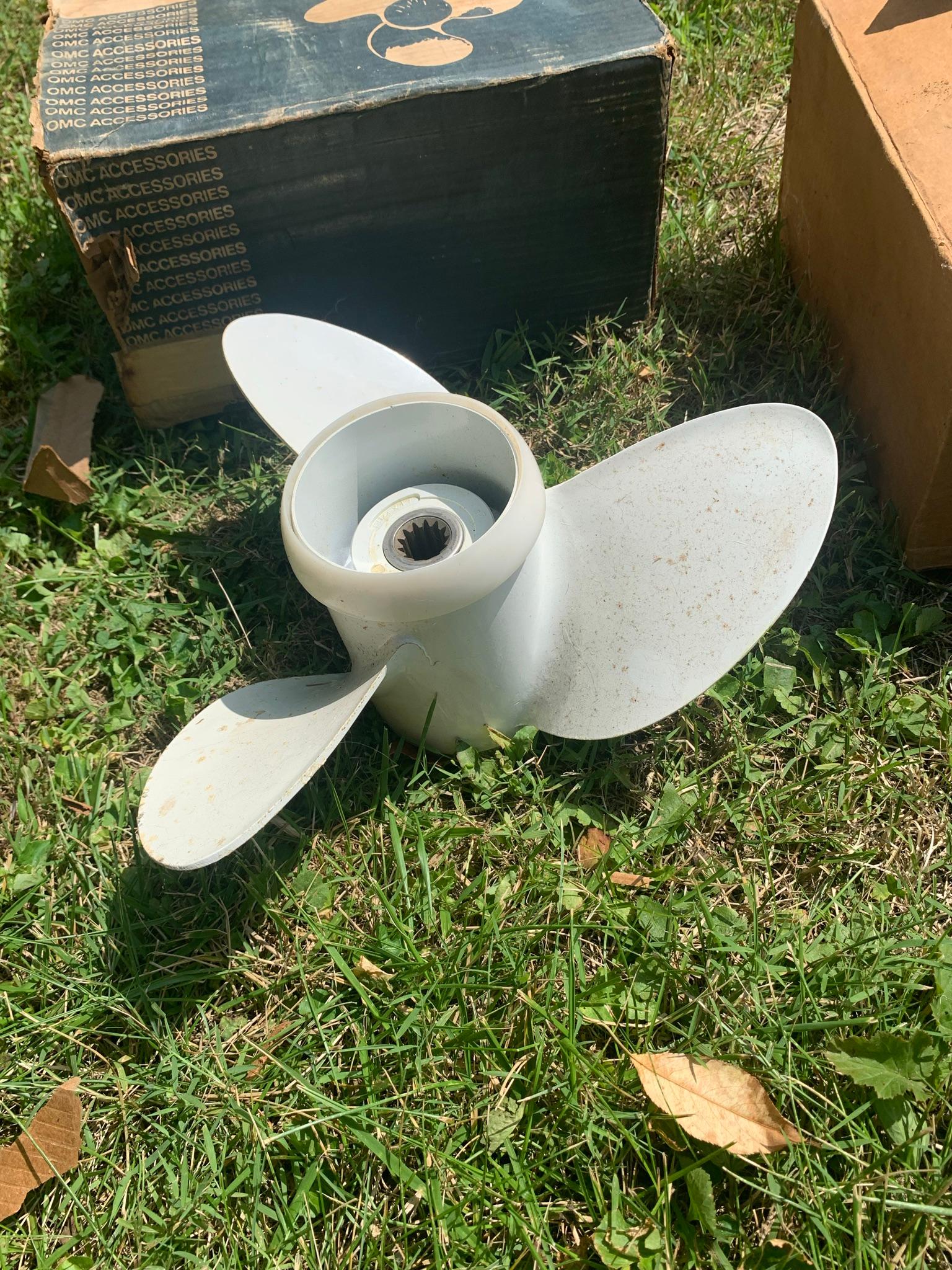 2 Boat Propellers.  1 by OMC.  See Photos for Damage