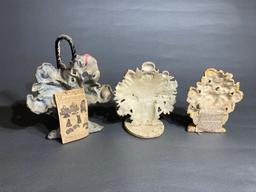 3 Antique Cast Iron Door Stops