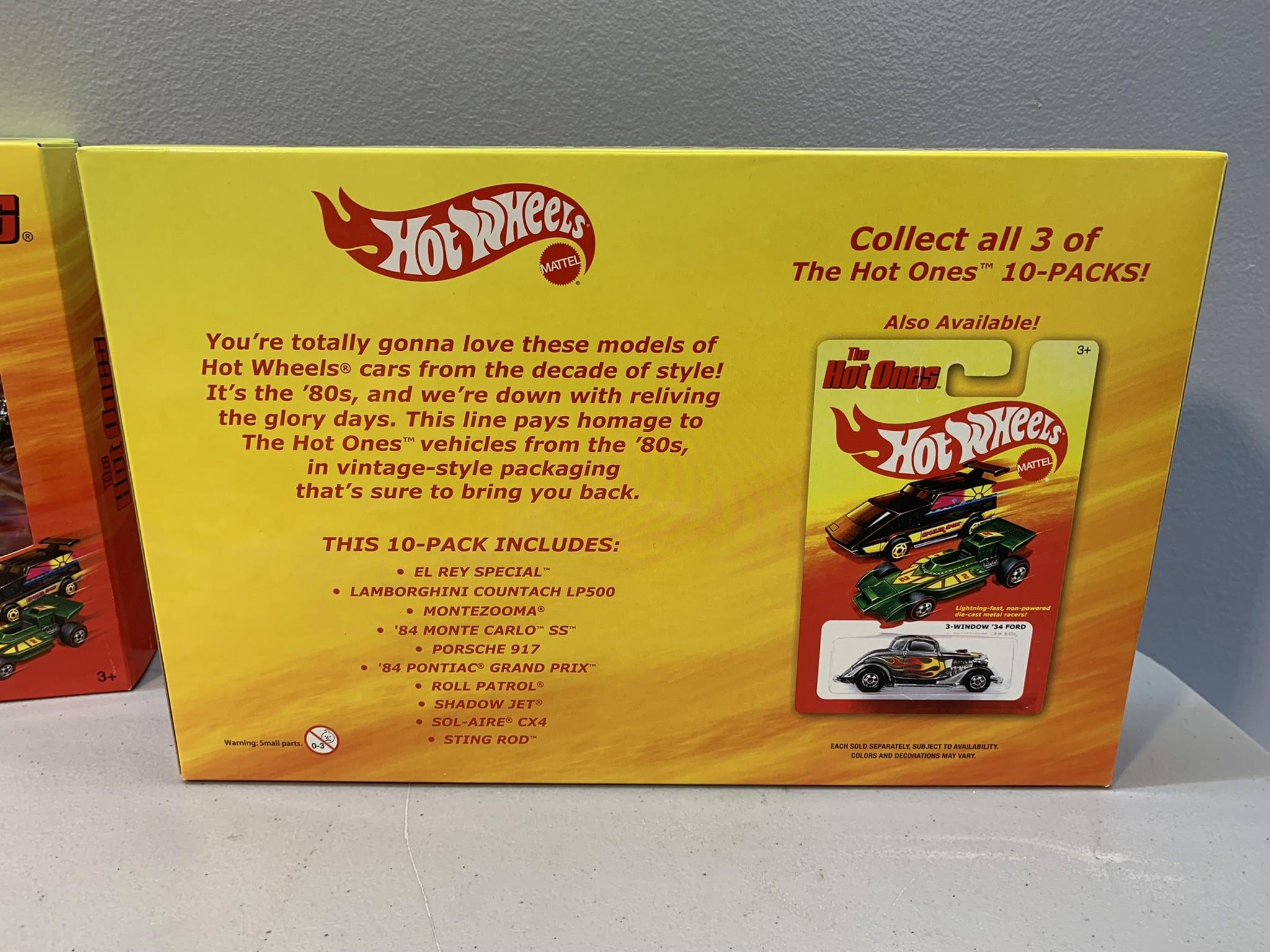Group of Collectable Hot Wheels -  Speed Packs 1,2,3 The Hot Ones, Large Hot Wheels T-shirt & More