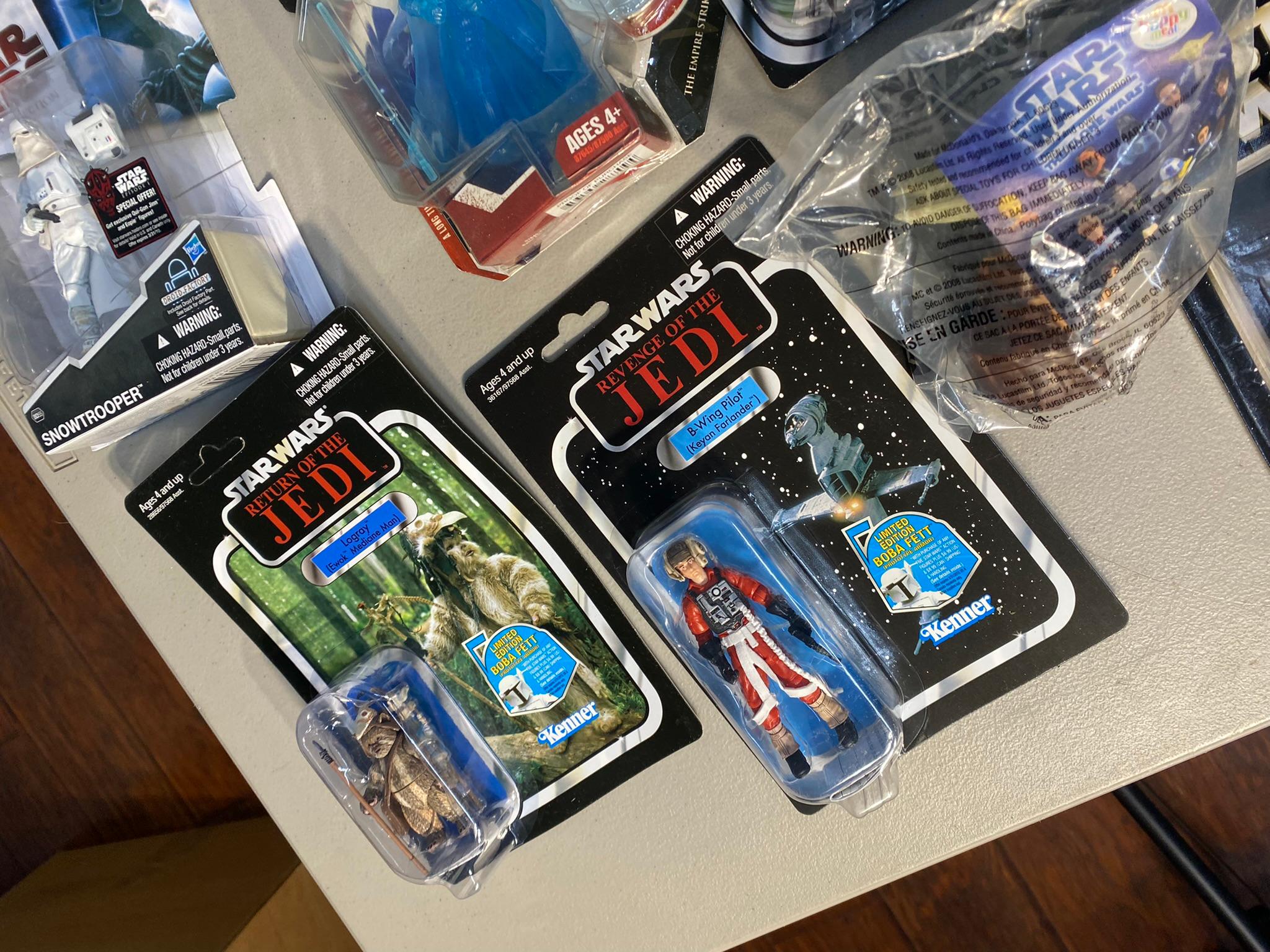Large Lot of Star Wars Action Figures in Packaging