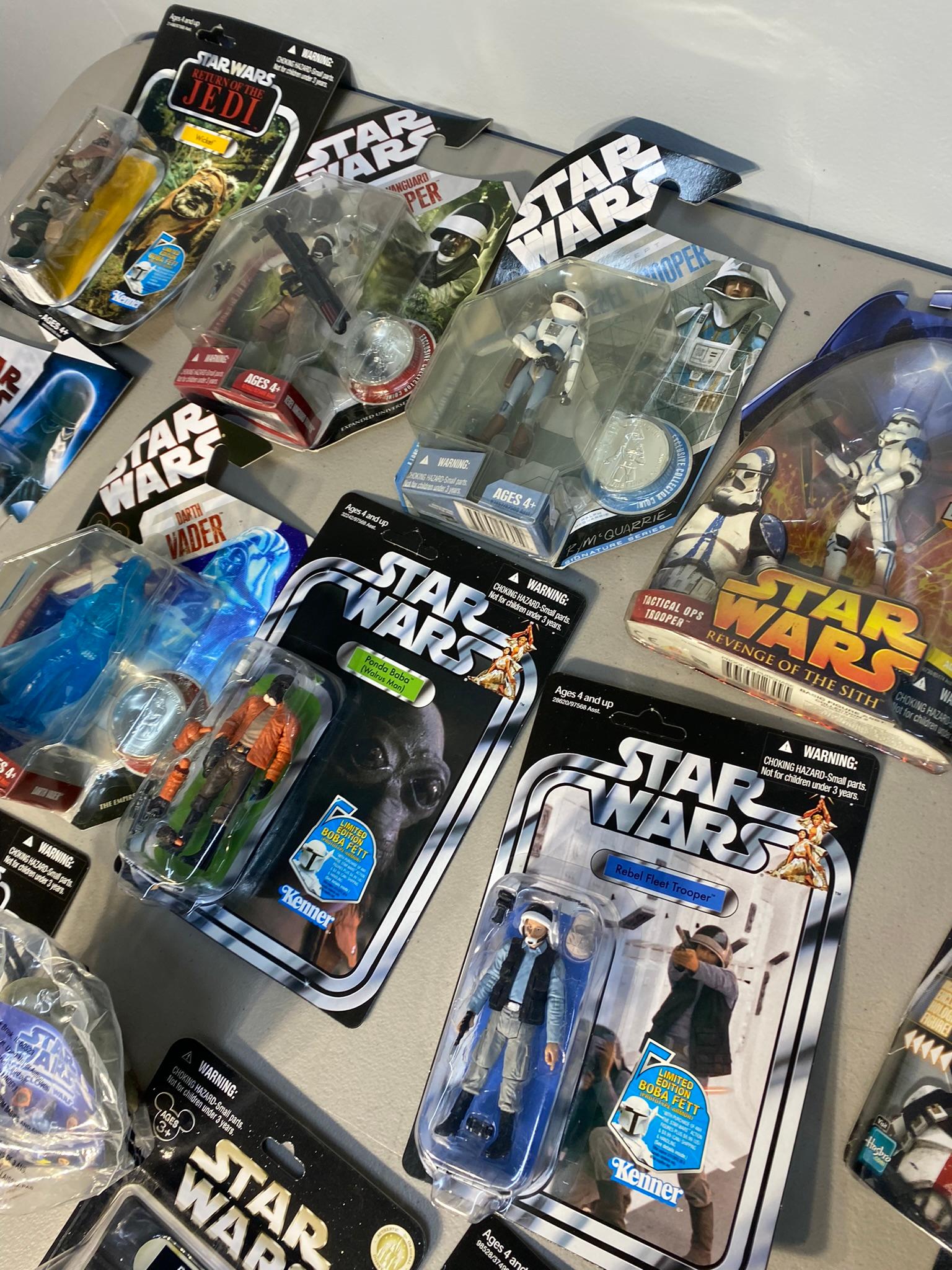 Large Lot of Star Wars Action Figures in Packaging