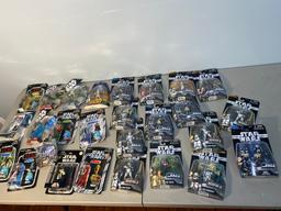 Large Lot of Star Wars Action Figures in Packaging