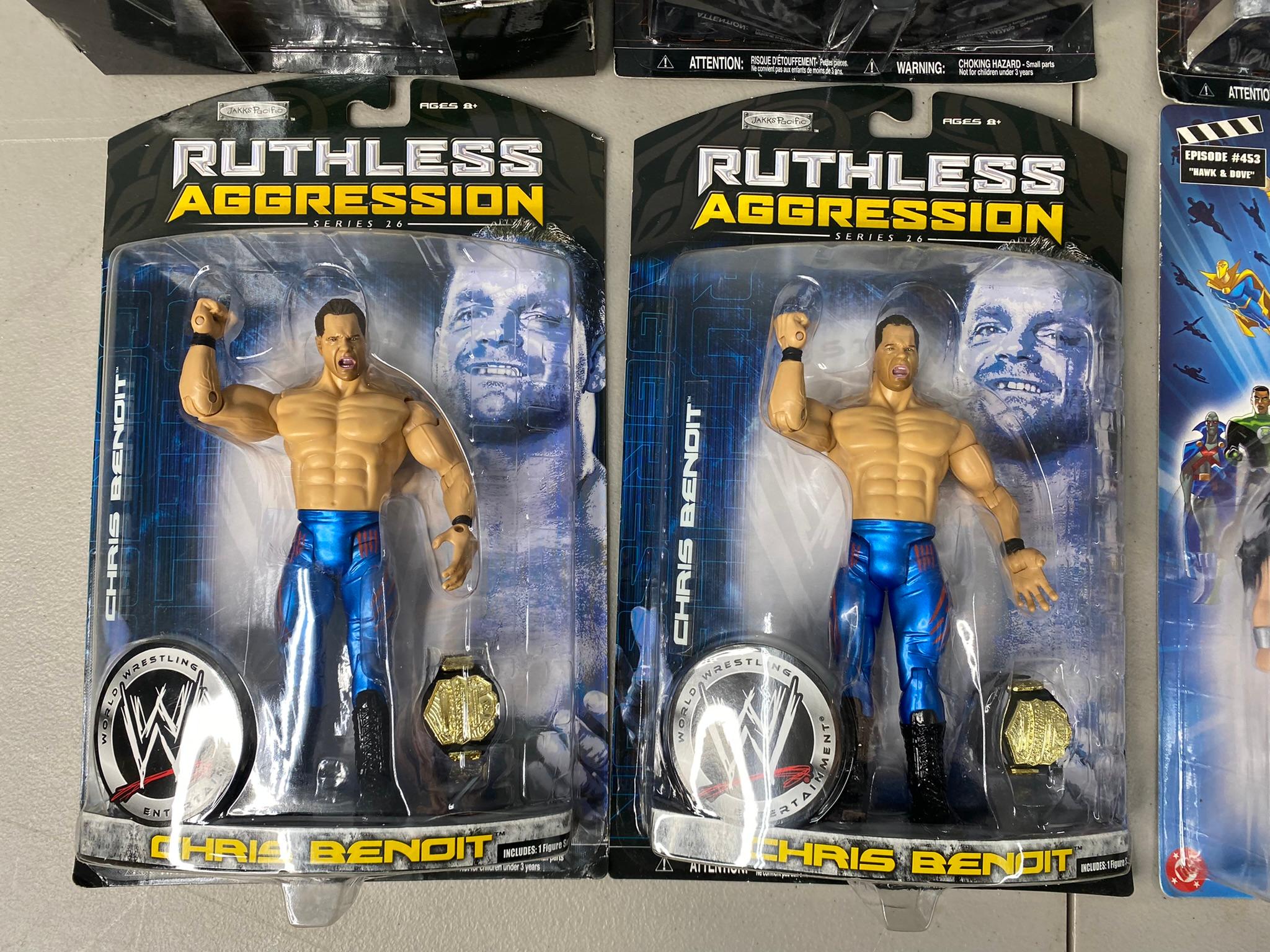 5 WWE Ruthless Aggression Action Figures and Justice League Action Figures New in Box.