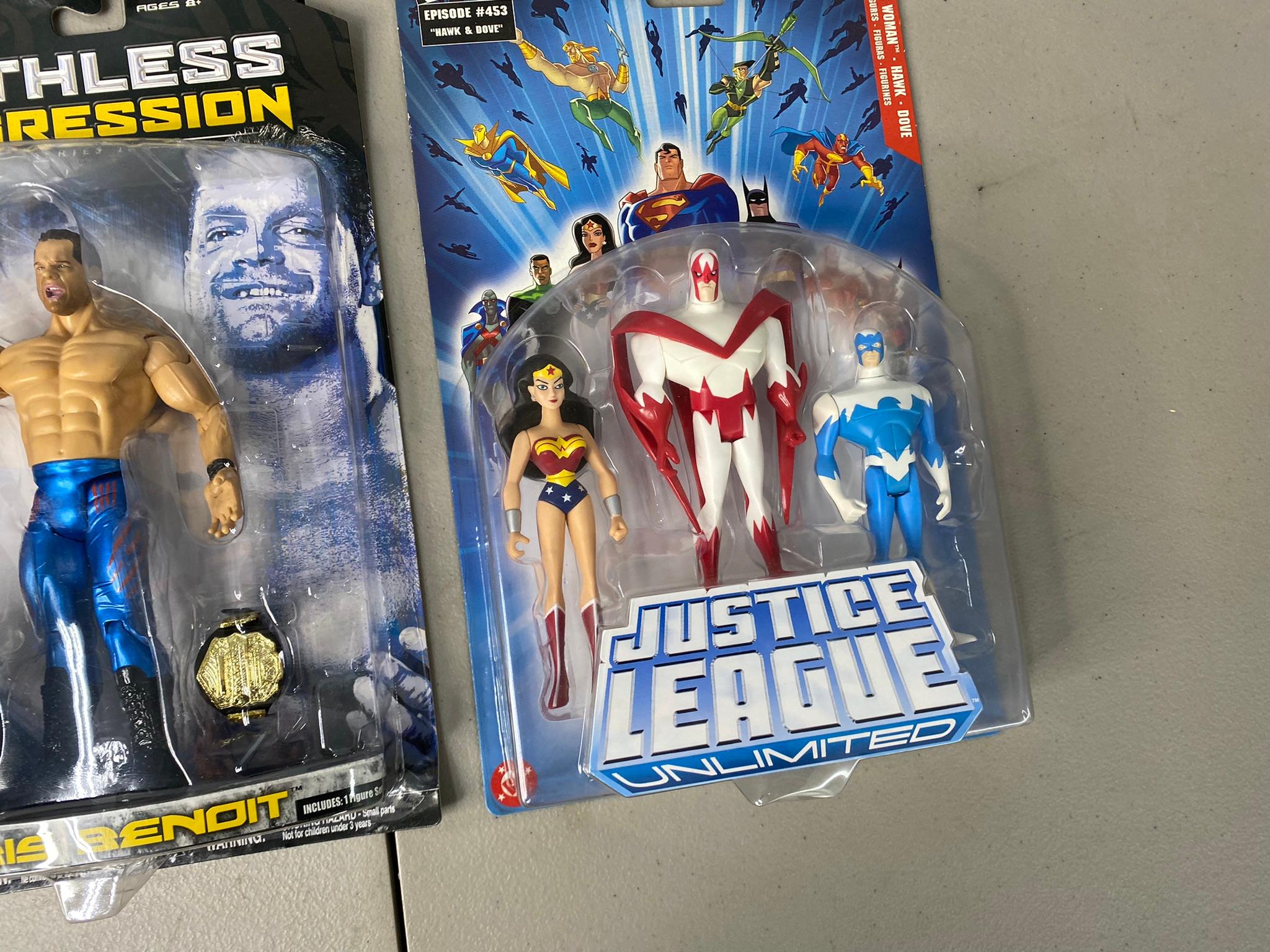 5 WWE Ruthless Aggression Action Figures and Justice League Action Figures New in Box.