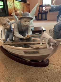 Four Lladro Ceramic Art Pieces plus 3 Wood Stands