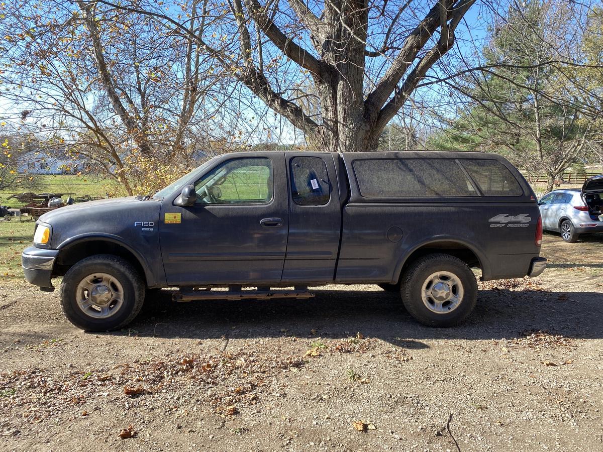 1999 Ford F-150 Super Cab 4x4 Pickup Truck.