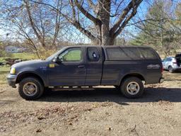 1999 Ford F-150 Super Cab 4x4 Pickup Truck.