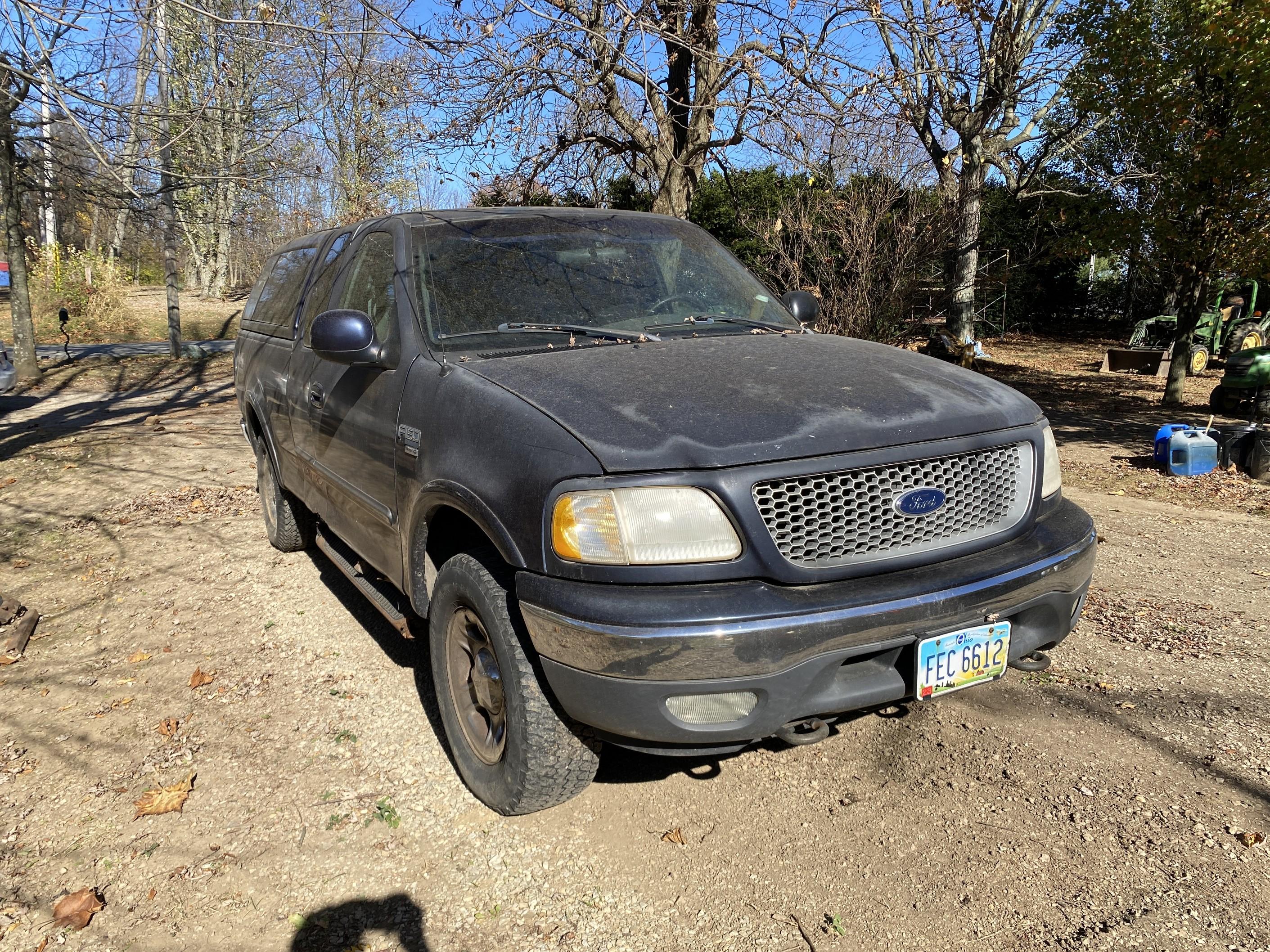 1999 Ford F-150 Super Cab 4x4 Pickup Truck.