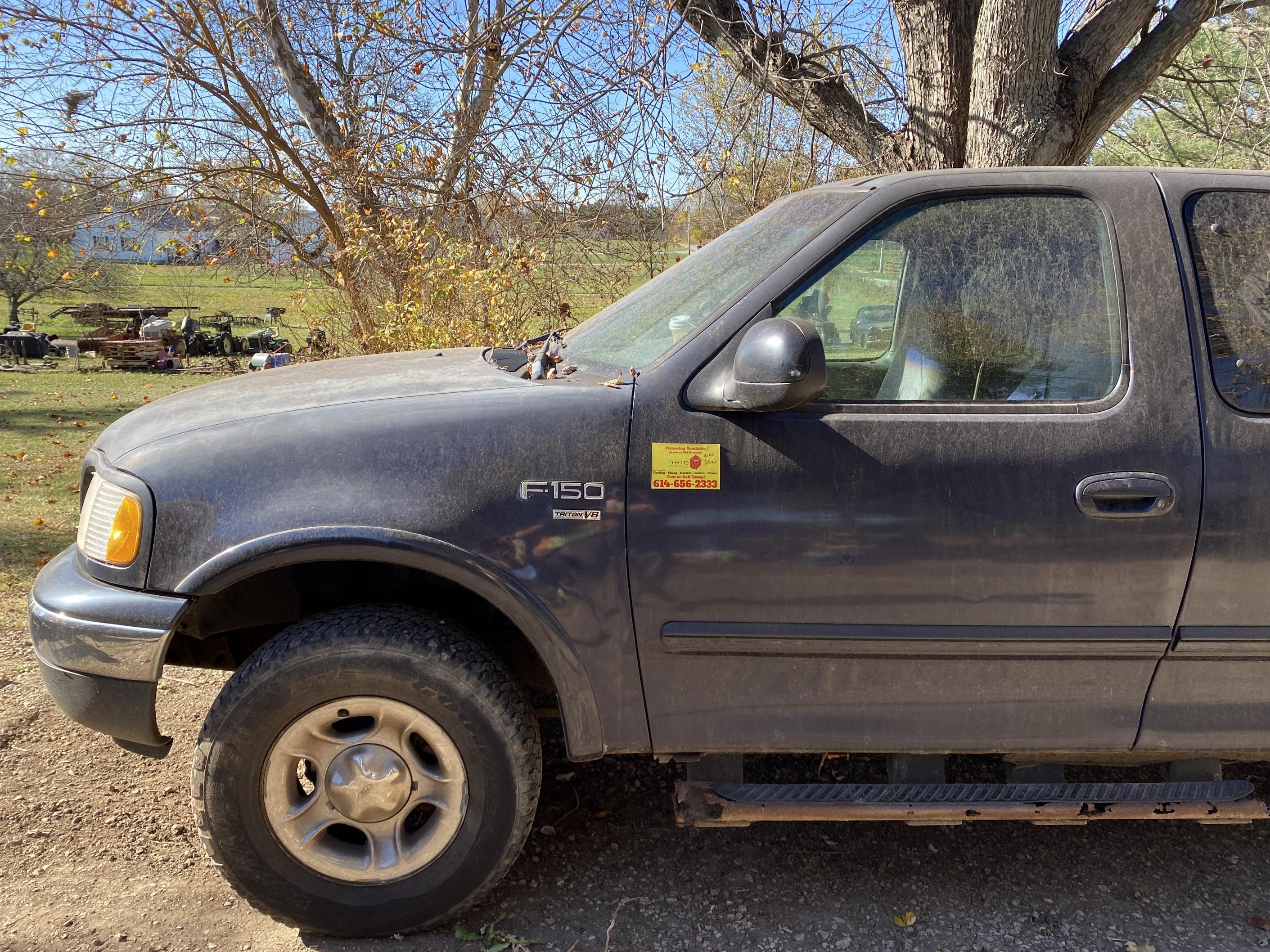 1999 Ford F-150 Super Cab 4x4 Pickup Truck.