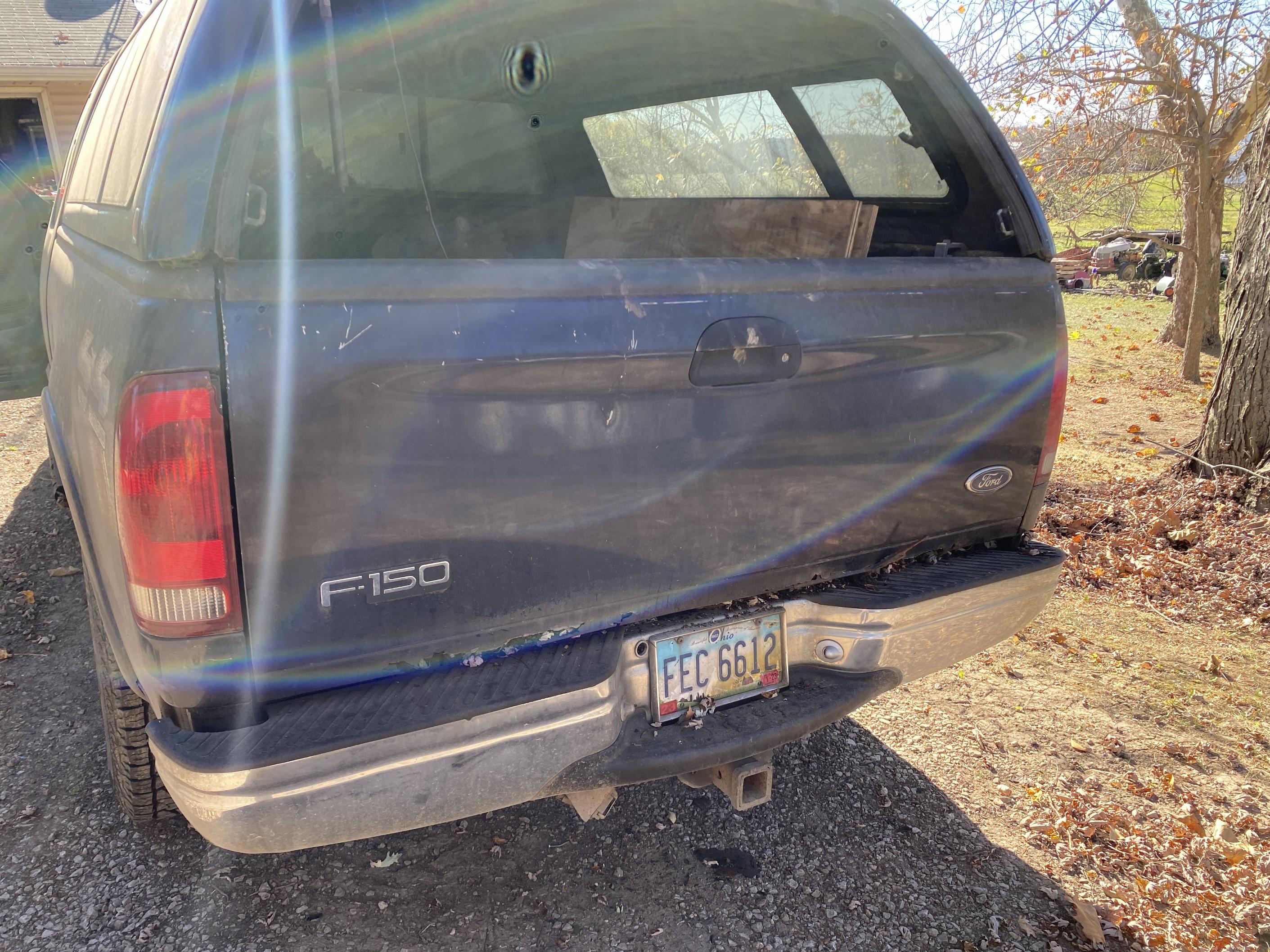 1999 Ford F-150 Super Cab 4x4 Pickup Truck.