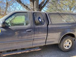 1999 Ford F-150 Super Cab 4x4 Pickup Truck.