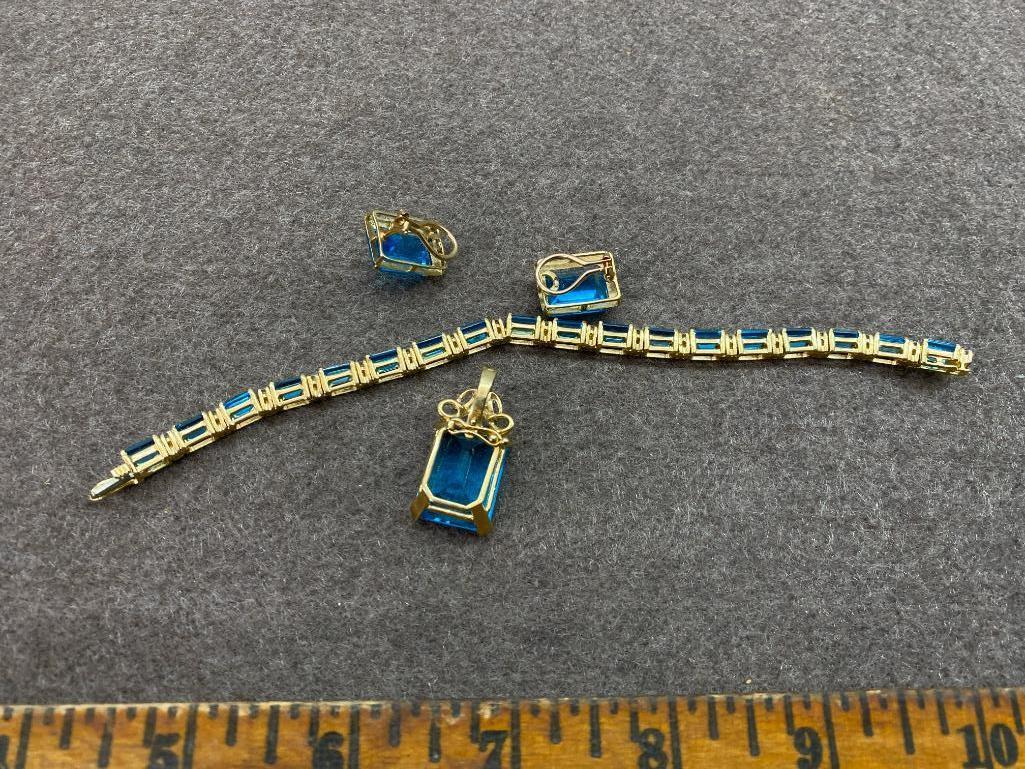 14k Gold Bracelet, Earrings, Pendant Set - 42.5 grams. Topaz