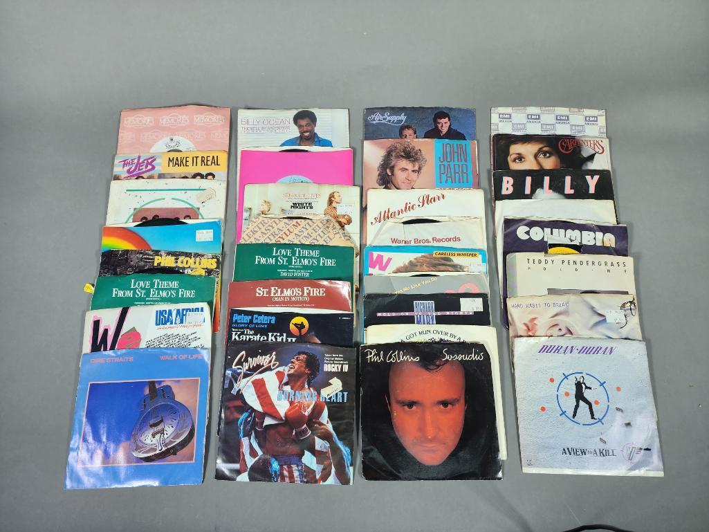 Group of 45 records With Sleeves - Dire Straits, Phil Collins, Duran Duran and More