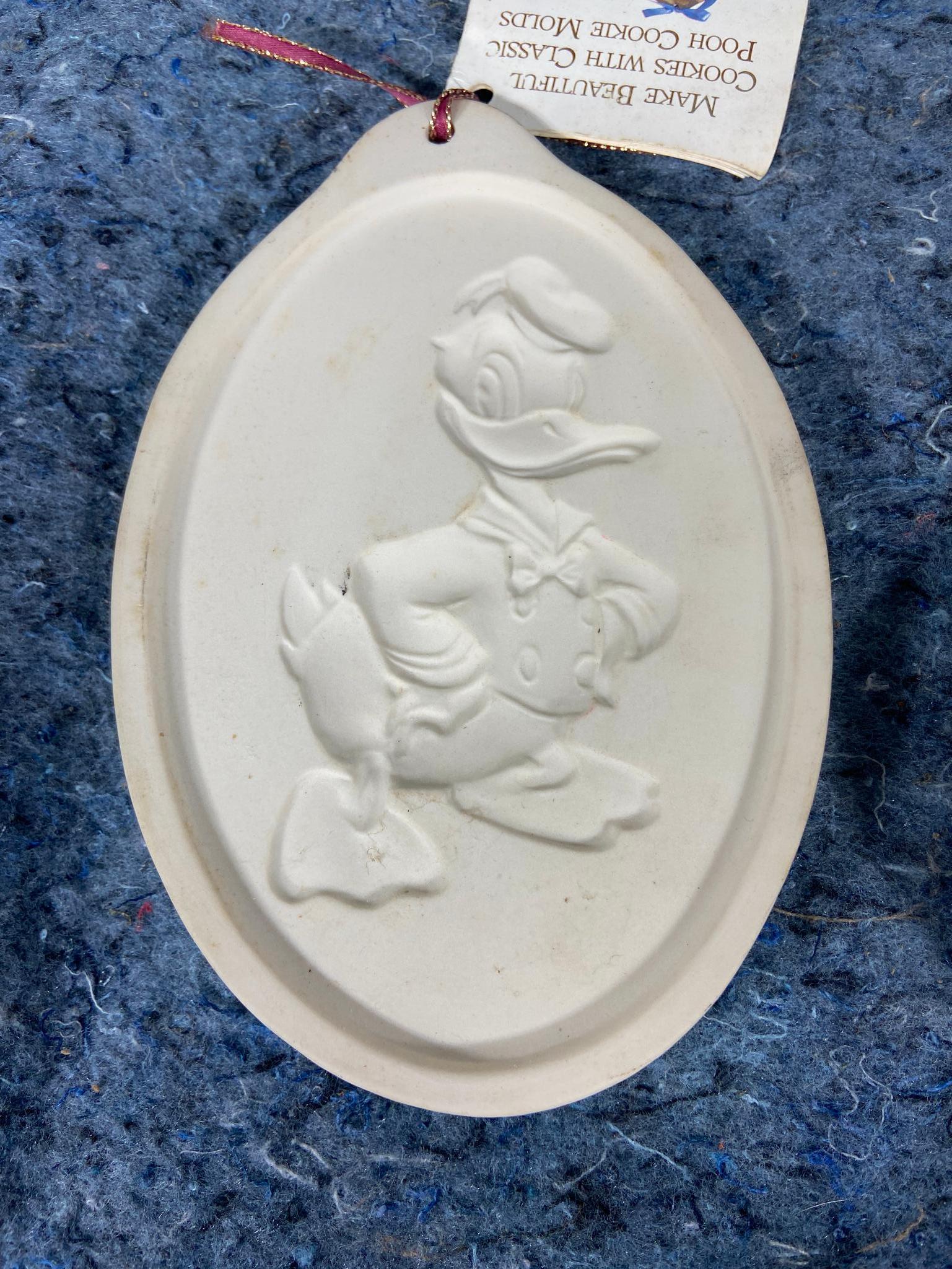 7 Vintage Cookie Molds including Mickey Mouse, Minnie Mouse, Donald Duck, Ohio State, and More