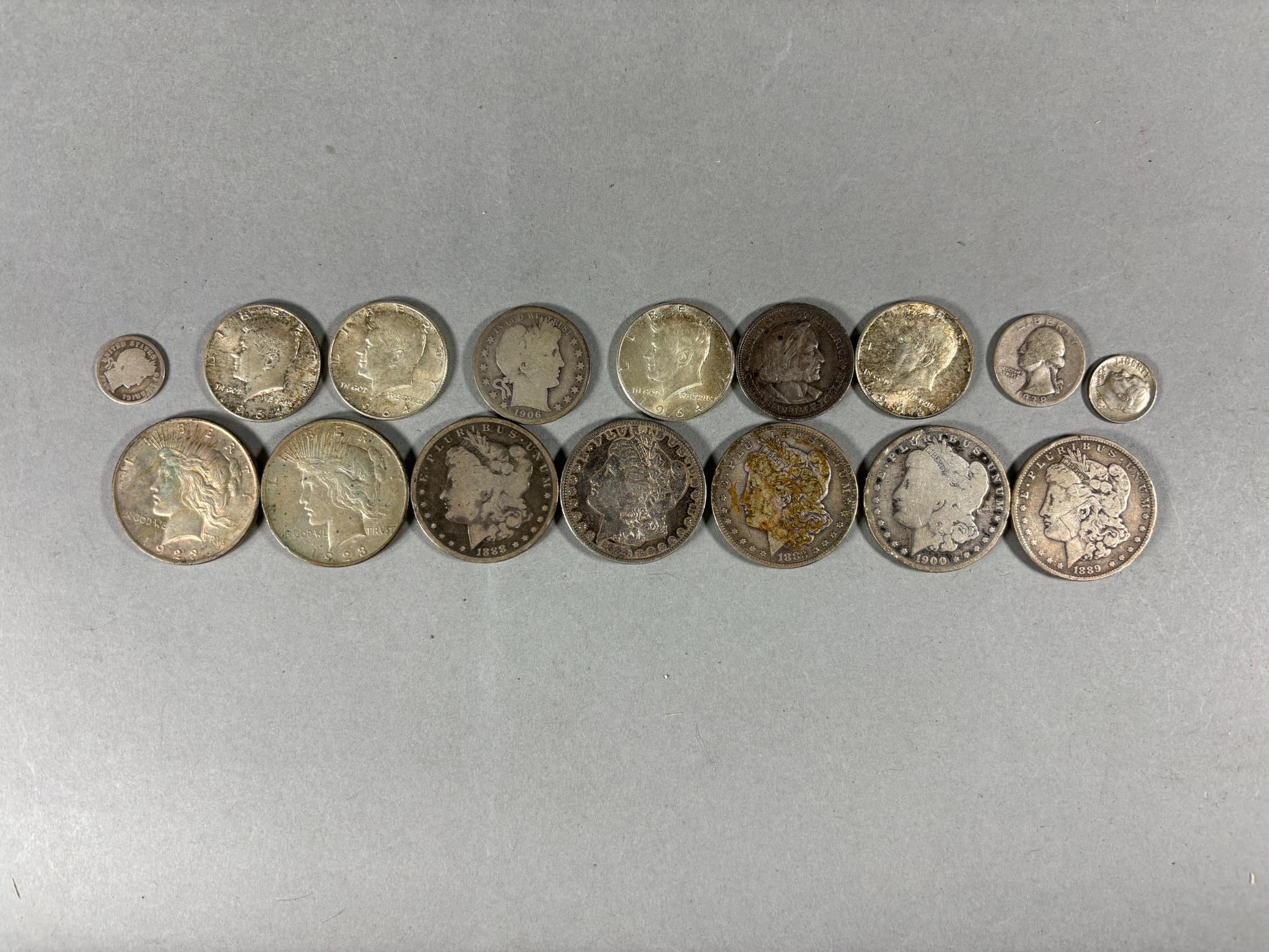 Group Lot of Silver Coins Including Morgan Dollars, Columbian Exhibition, Peace Dollars