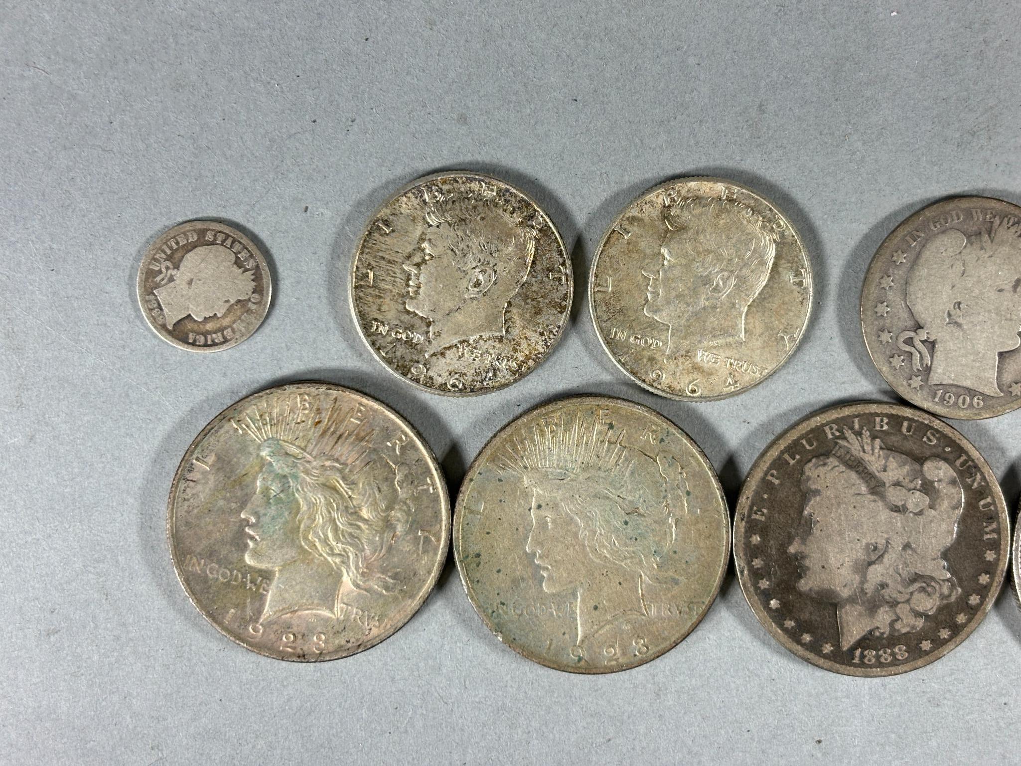 Group Lot of Silver Coins Including Morgan Dollars, Columbian Exhibition, Peace Dollars