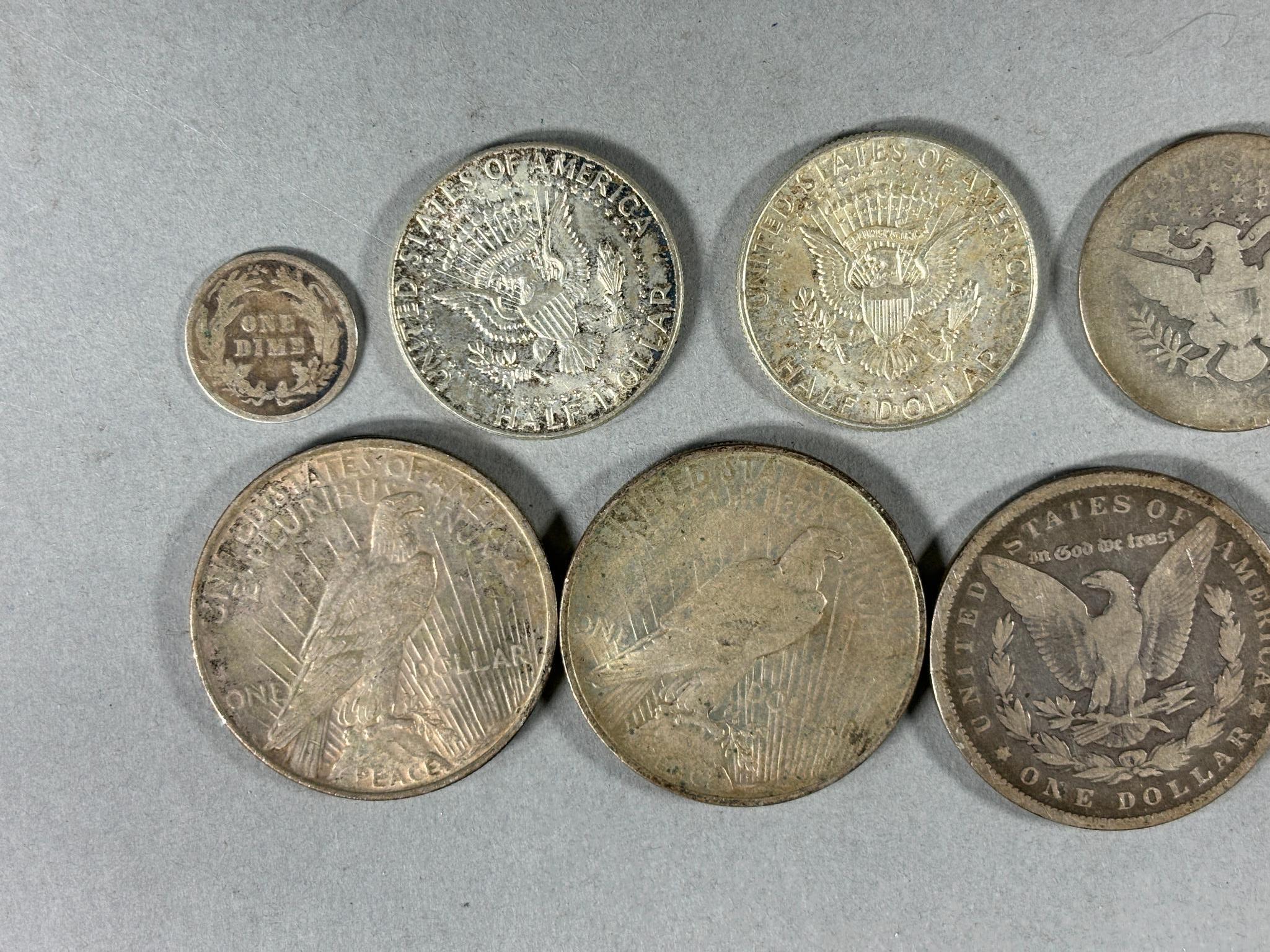 Group Lot of Silver Coins Including Morgan Dollars, Columbian Exhibition, Peace Dollars