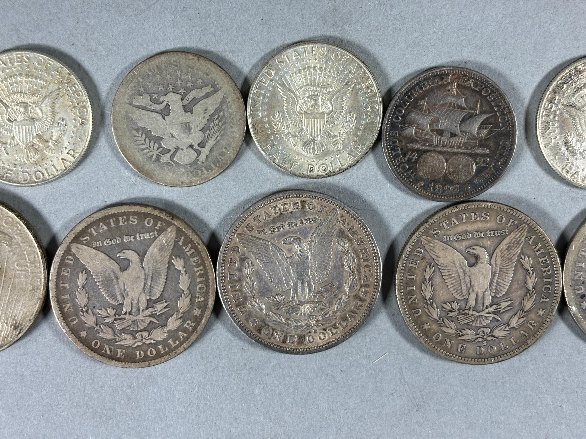 Group Lot of Silver Coins Including Morgan Dollars, Columbian Exhibition, Peace Dollars