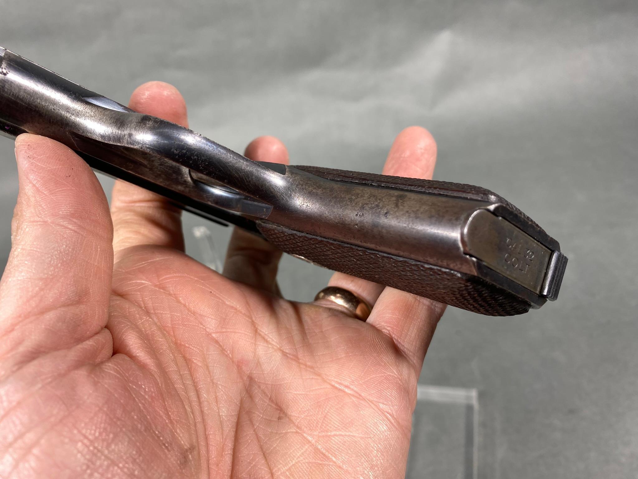 Colt Model 1903 Hammerless Pistol with Magazine