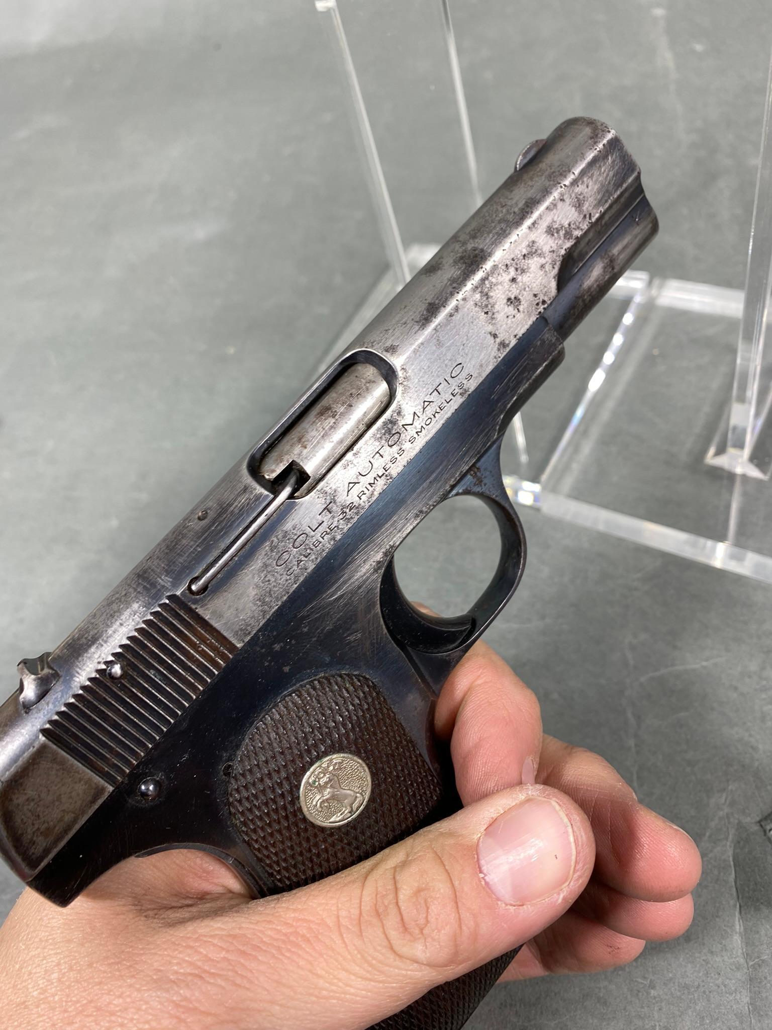 Colt Model 1903 Hammerless Pistol with Magazine