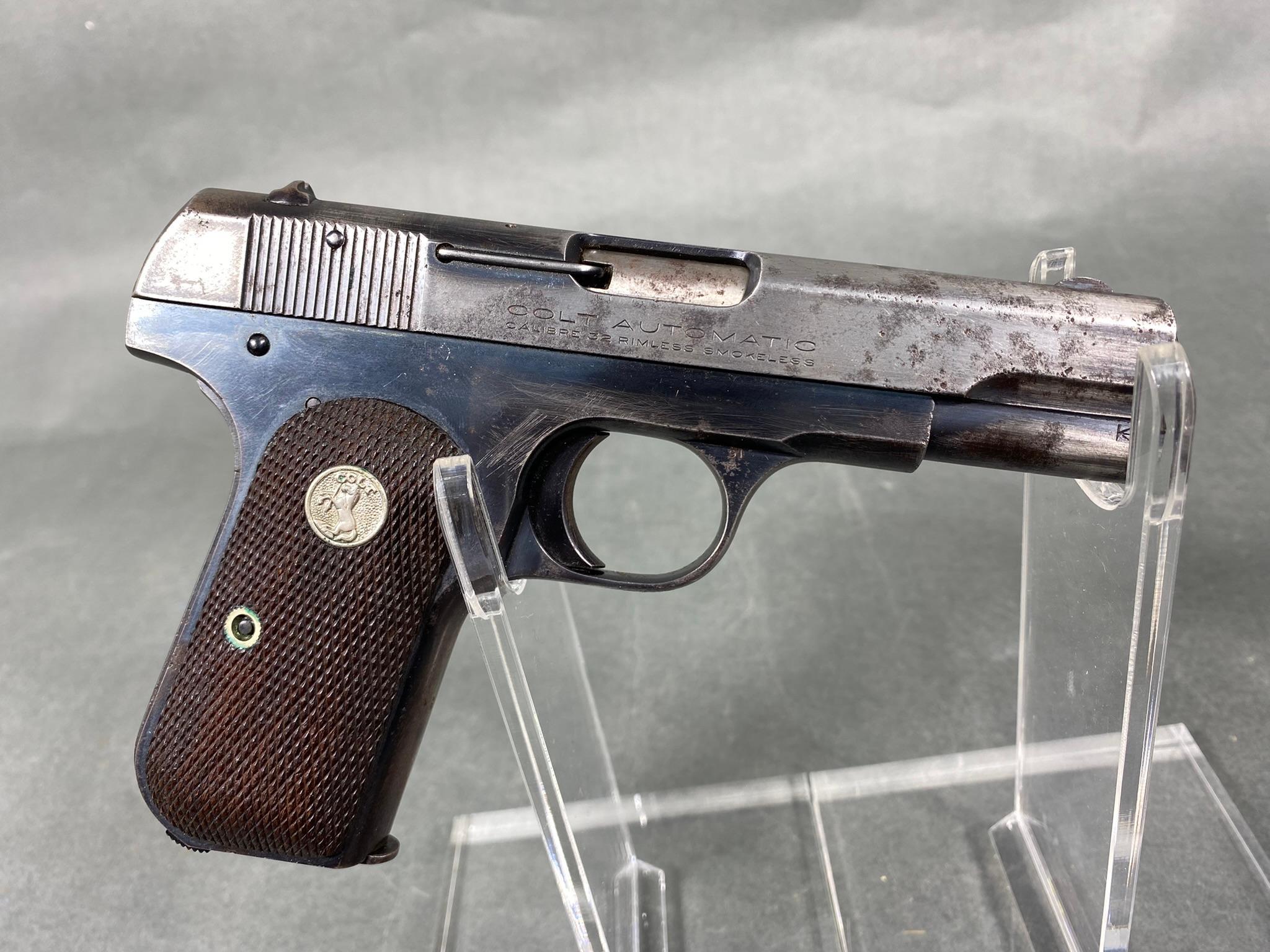 Colt Model 1903 Hammerless Pistol with Magazine