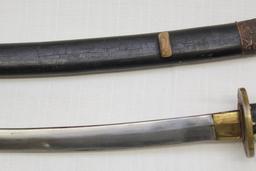 Katana in wooden scabbard showing wear having