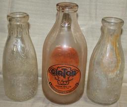 3 milk bottles, printed "Girton Farm Equipment,