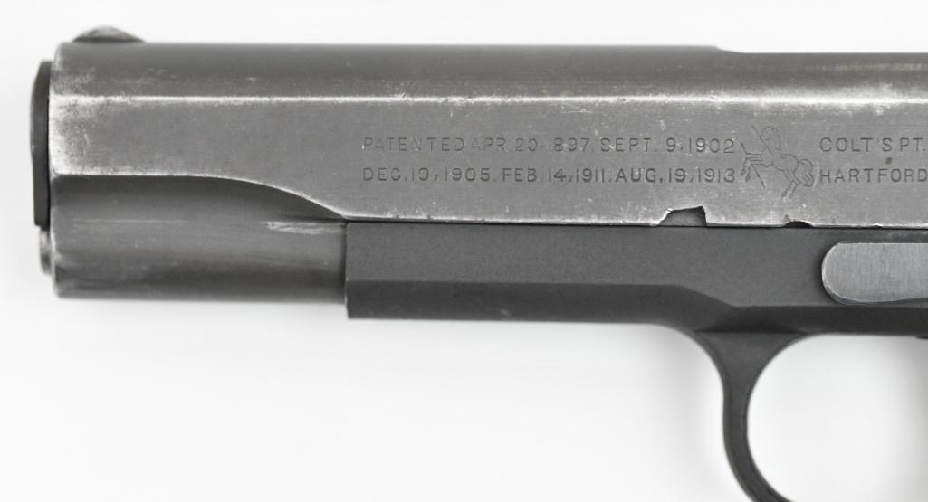 Olympic Arms/Colt Model 1911 pistol.