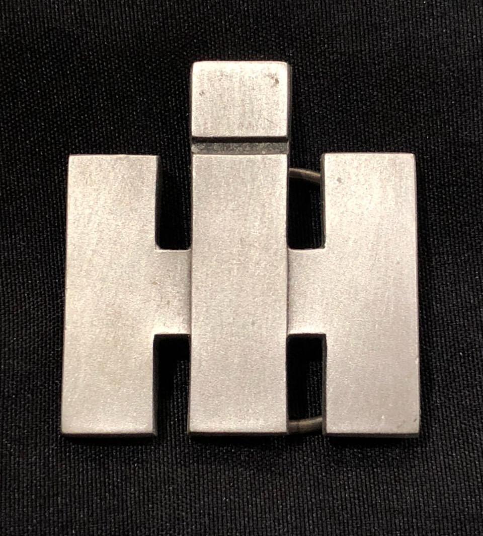 IH LOGO BELT BUCKLE BY SPEC CAST