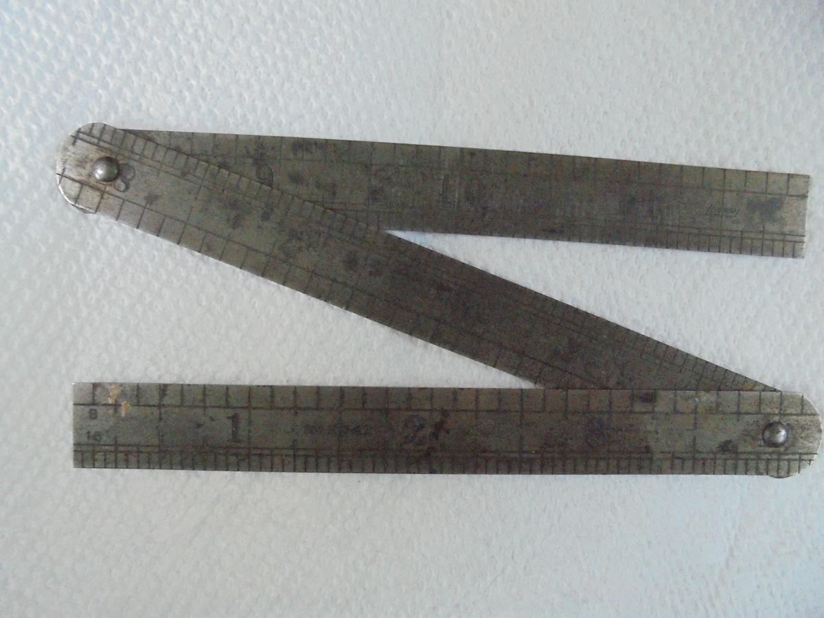VINTAGE STEEL FOLDING POCKET RULE WITH ADVERTISING "WESTINGHOUSE TRACTION BRAKE COMPANY"