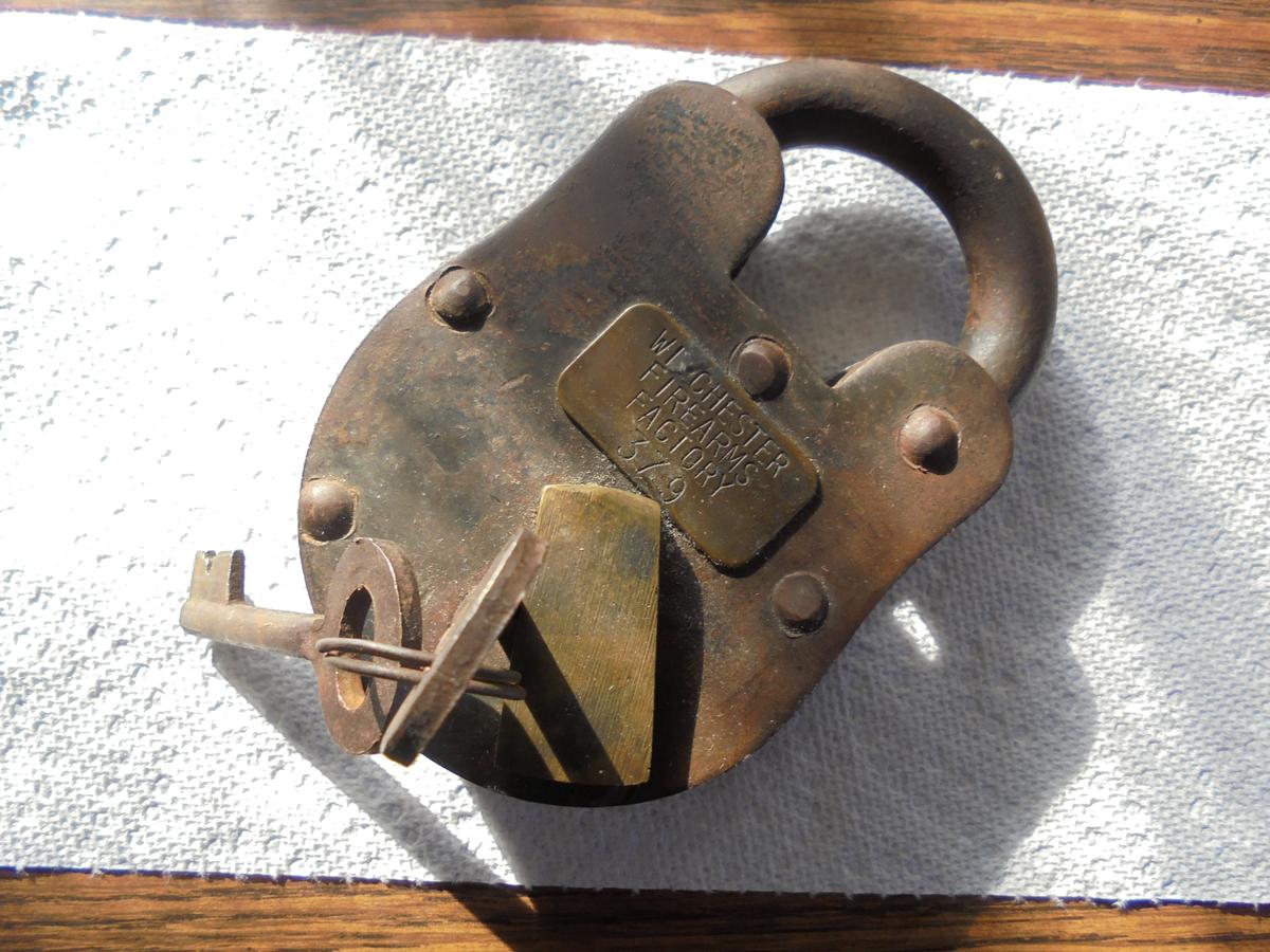 LARGE OLD PADLOCK 'WINCHESTER FIREARMS FACTORY' ON BRASS PLATE