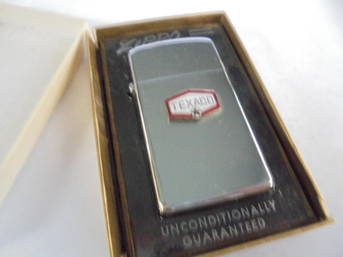 OLD ZIPPO CIGARETTE LIGHTER IN BOX WITH ADVERTISING FROM"TEXACO"-LOOKS NEVER USED