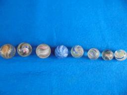 8 OLD SWIRL TYPE MARBLES IN SIZE RANGES-PLAY WITH
